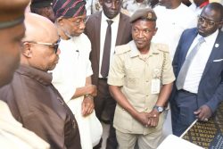 Adeleke and Aregbesola, flanked by aides at the commissioning of the Ilesa Passport Front Office