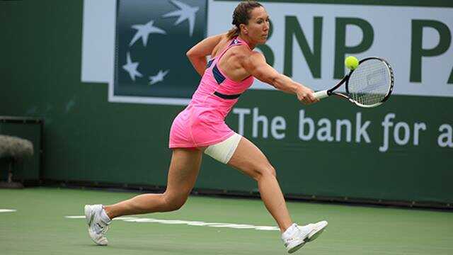 Jankovic wins in wet and windy Qatar