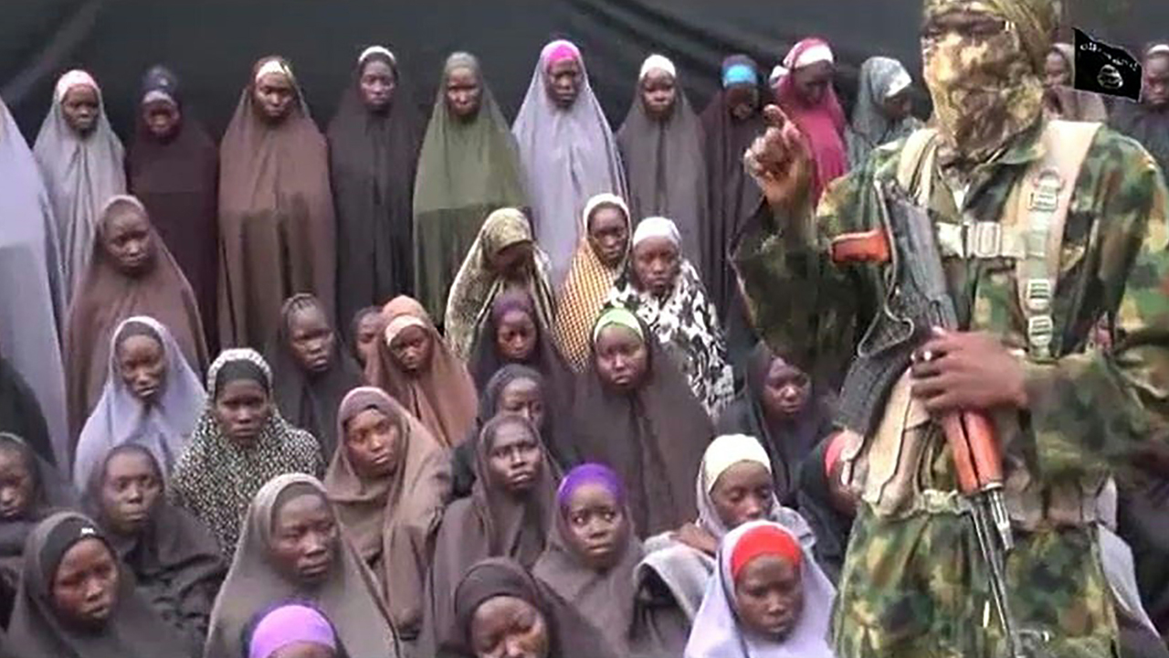 Chibok Girls With AK-47s Explain Their Refusal To Return In New Video