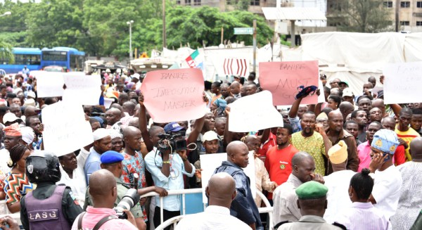 Protesters Storm Ambode’s Office, Demand Expulsion of Muiz Banire From Party