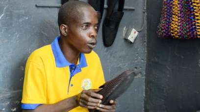 Inspiring!!! Meet Endurance Otobi, The Blind Shoe Cobbler Who Defied All Odds