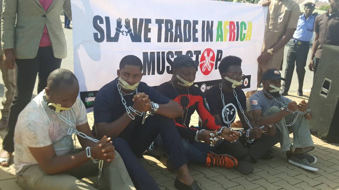 Charlyboy Group Strapped In Chains To Protest Libya Slave Trade In Abuja