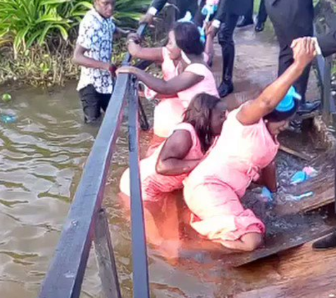 PHOTO OF THE DAY: Bridesmaids Fall Into Stream Before Getting To Venue