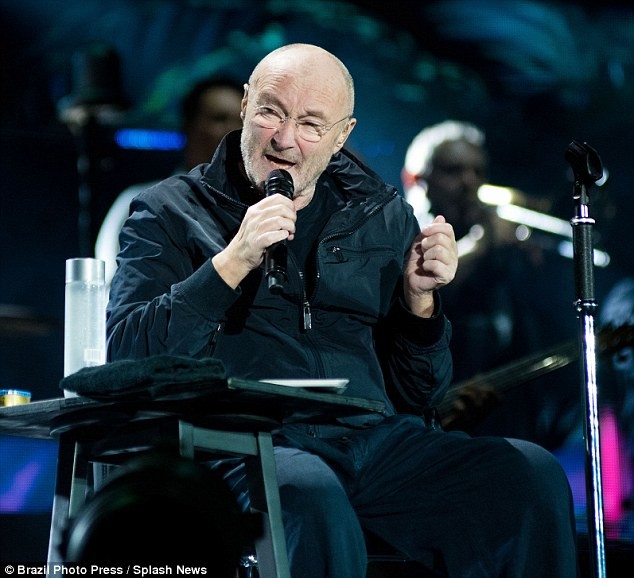 Phil Collins Returns On Stage But Can’t Perform Standing