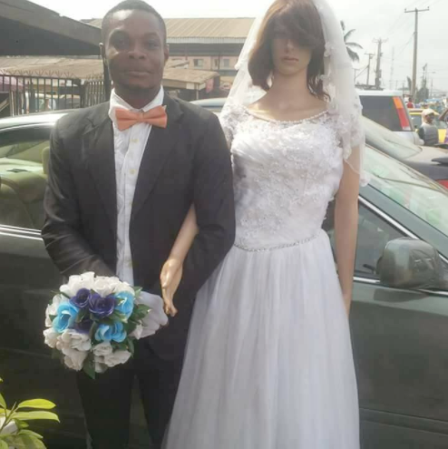 PHOTOS: Black Man Marries Sex Doll In Lagos