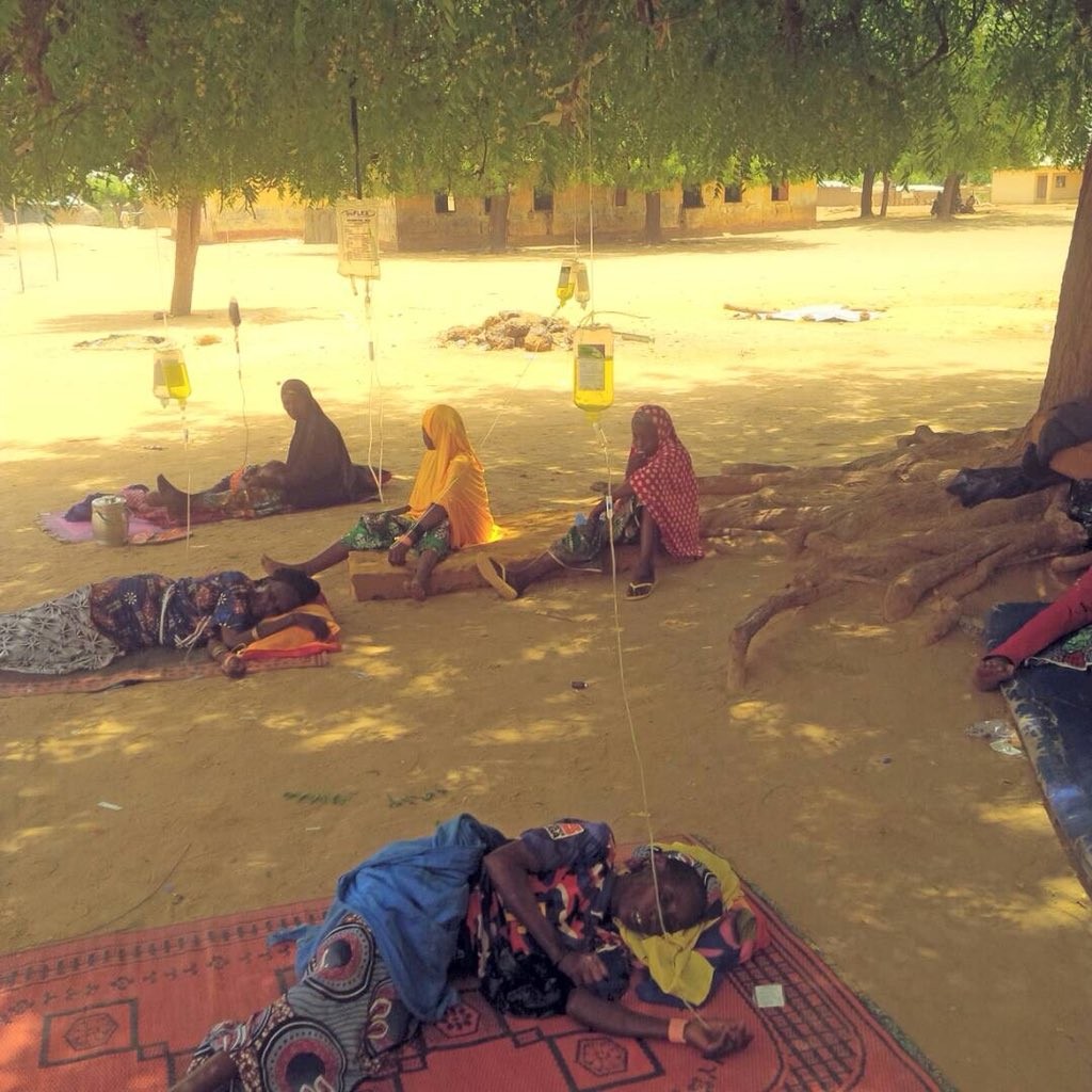 Photo Of The Day: Shocking Picture Of Sokoto Residents Receiving Drips Under A Tree