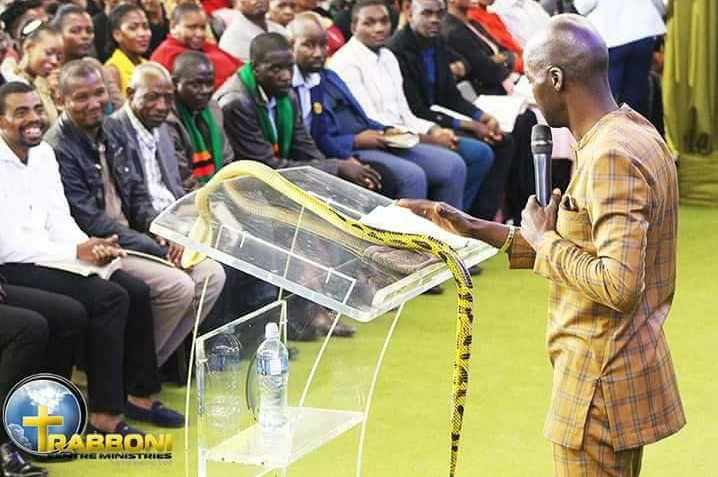 South African Prophet, Lesego Daniel Uses Life Snake To Heal Members