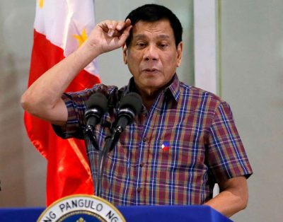 President Duterte Under Criticism For Kissing Woman