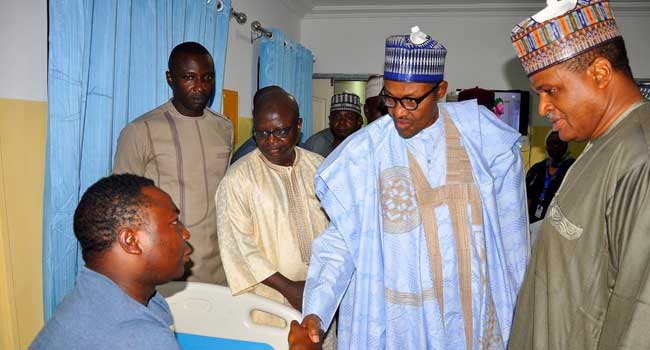 President Buhari Visits Injured Nigerian Air Force Pilots In Hospital