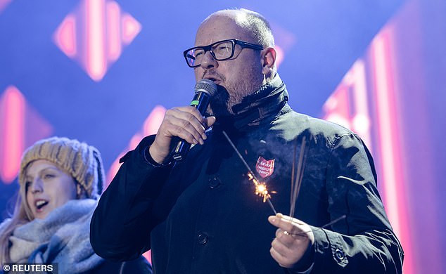 Polish Mayor Fighting For His Life After He Was Stabbed On Stage