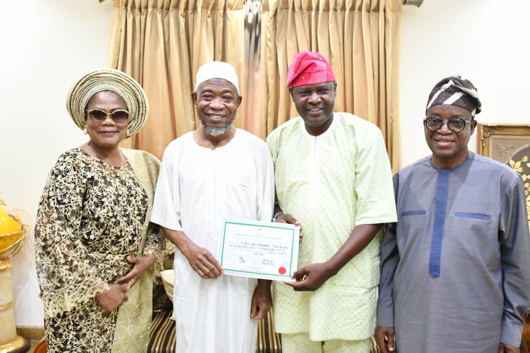 Osun Assembly Member-Elect, Adedoyin Presents Certificate Of Return To Aregbesola