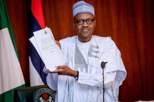 JUST IN: Buhari Signs 2019 Budget Into Law