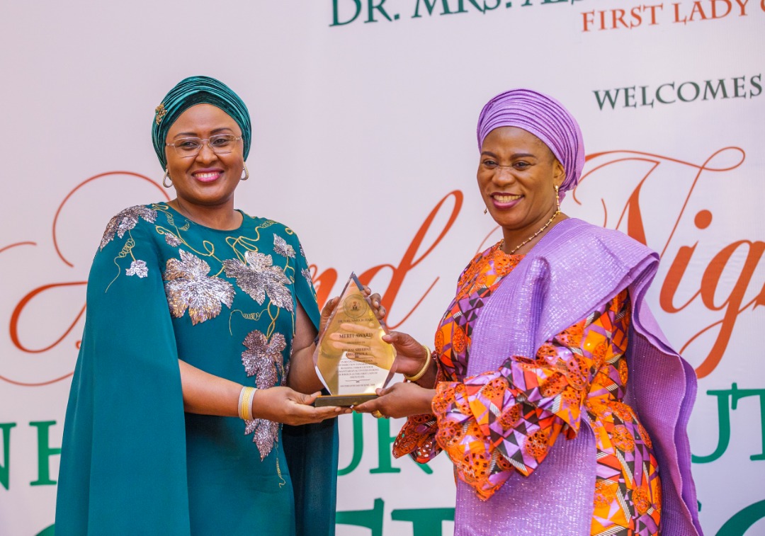 PHOTONEWS: Aisha Buhari Honours Aregbesola’s Wife, Others