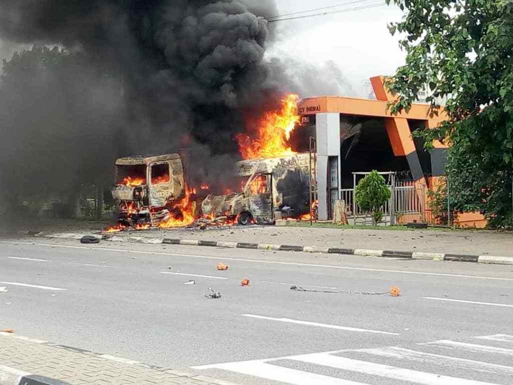 BREAKING: Police Open Fire As Shi’ites Set NEMA Office Ablaze In Abuja