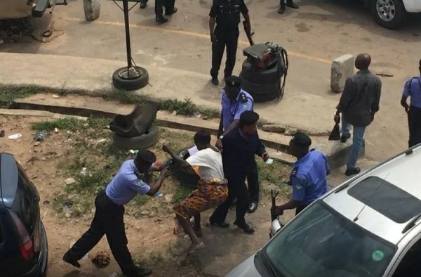 Police Brutalize Elderly Woman, #RevolutionNow Protesters In Osogbo