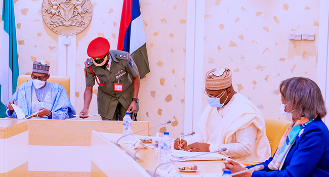 President Buhari Receives INEC Chairman, Commissioners