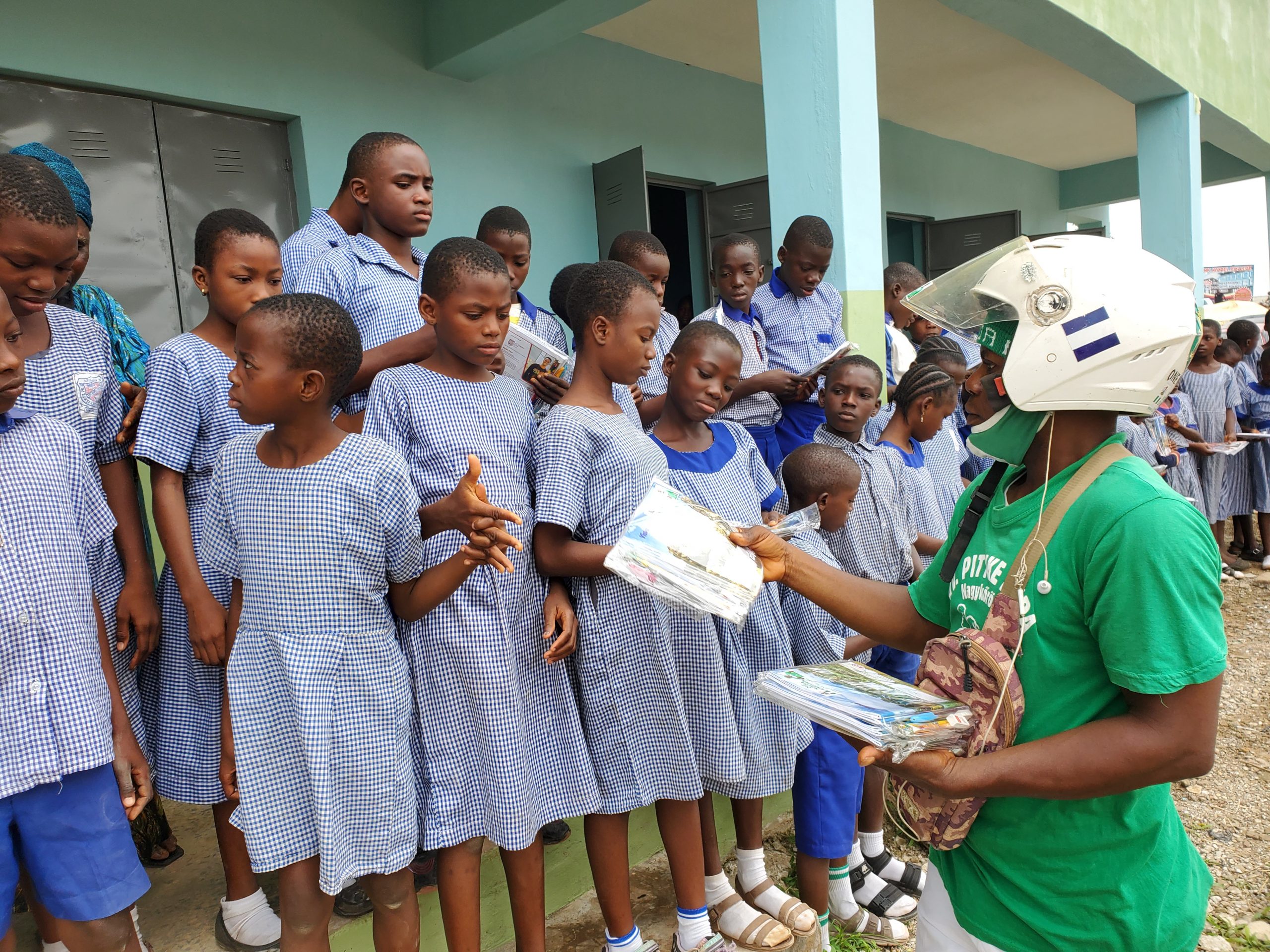 Bike Man Donates Writing Materials TO  Pupils In Ibadan
