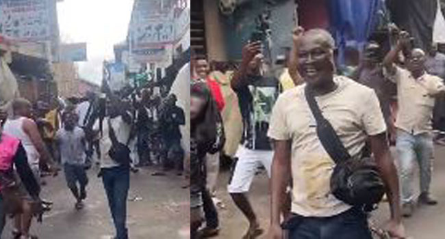 Lagos Police Trails Man Captured Firing AK-47 Rifle To Celebrate Reopening Of Ladipo Market (Video)